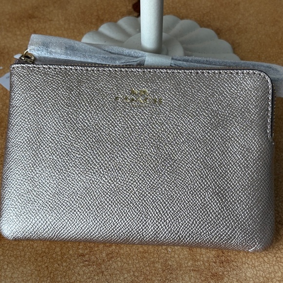Coach Platinum Wristlet - Picture 1 of 9